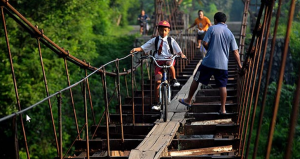 Children-in-Indonesia-Travel-to-School-on-Suspended-Aqueduct